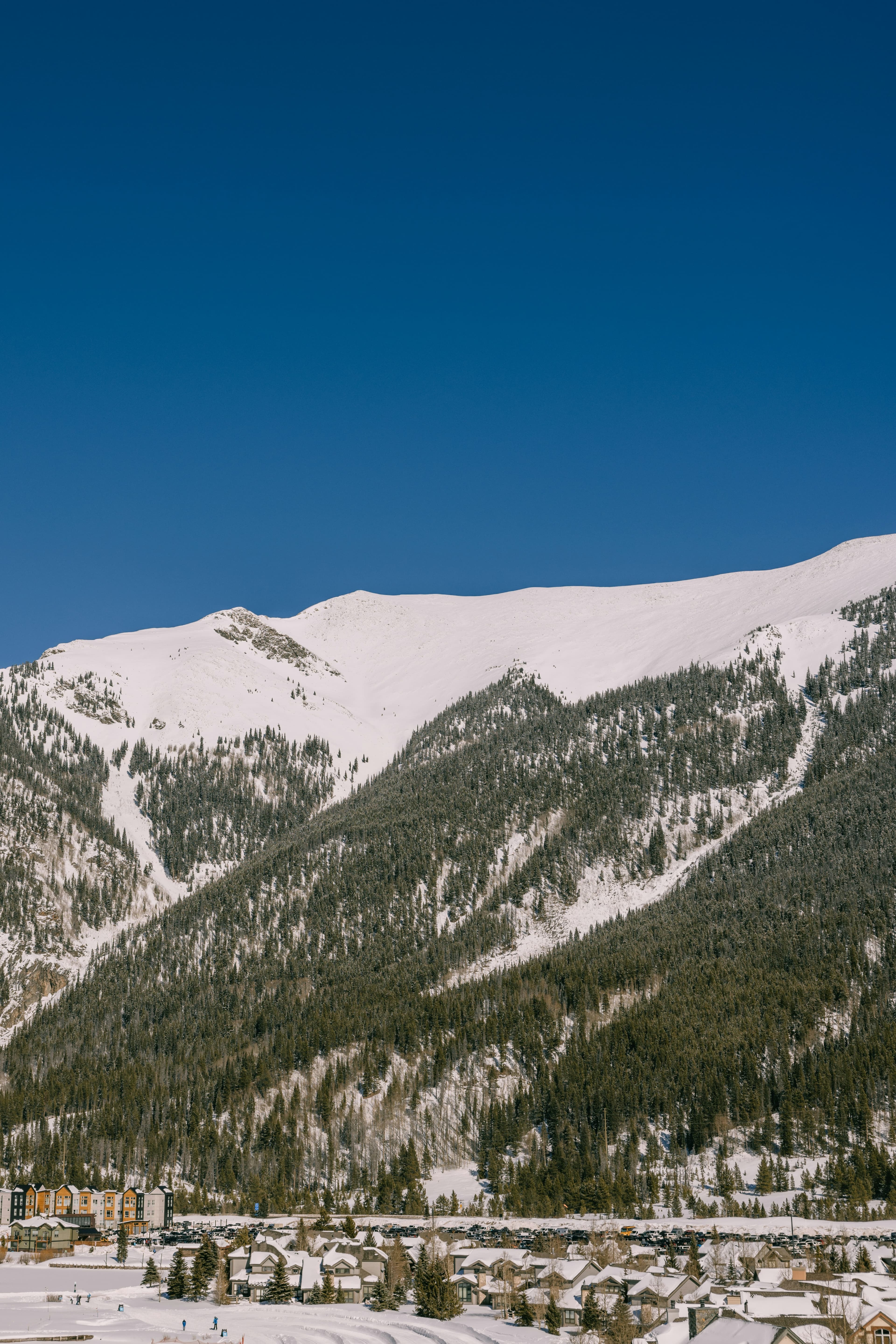 Snow-covered peaks above the base village at Copper Mountain in Summit County, Colorado