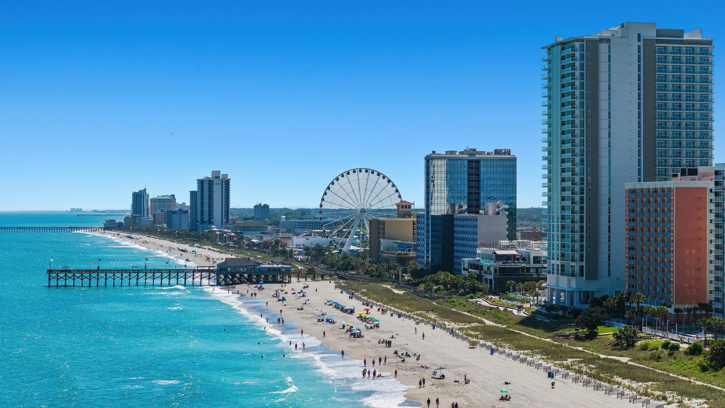 Myrtle Beach shoreline with a Ferris wheel in the distance, South Carolina